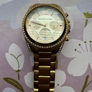 Michael Kors rose gold women’s watch